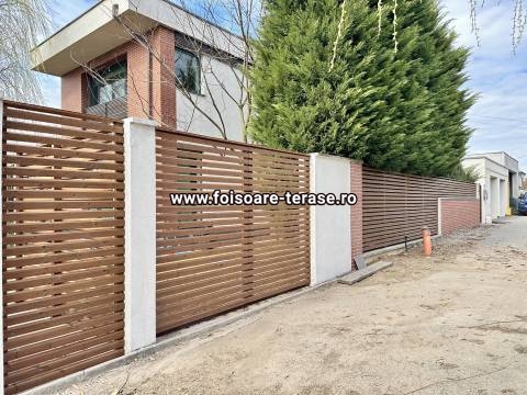 Gard din lemn termotratat cu rezistența in timp garantata de producător, pana la 20 ani, prindeți holșuruburi inox
